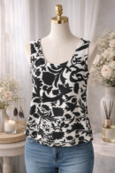 Ensemble deux pièces élégant noir et blanc à motifs floral.